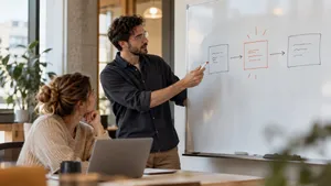 Engineer sketching a new service layer between an existing app and a model provider